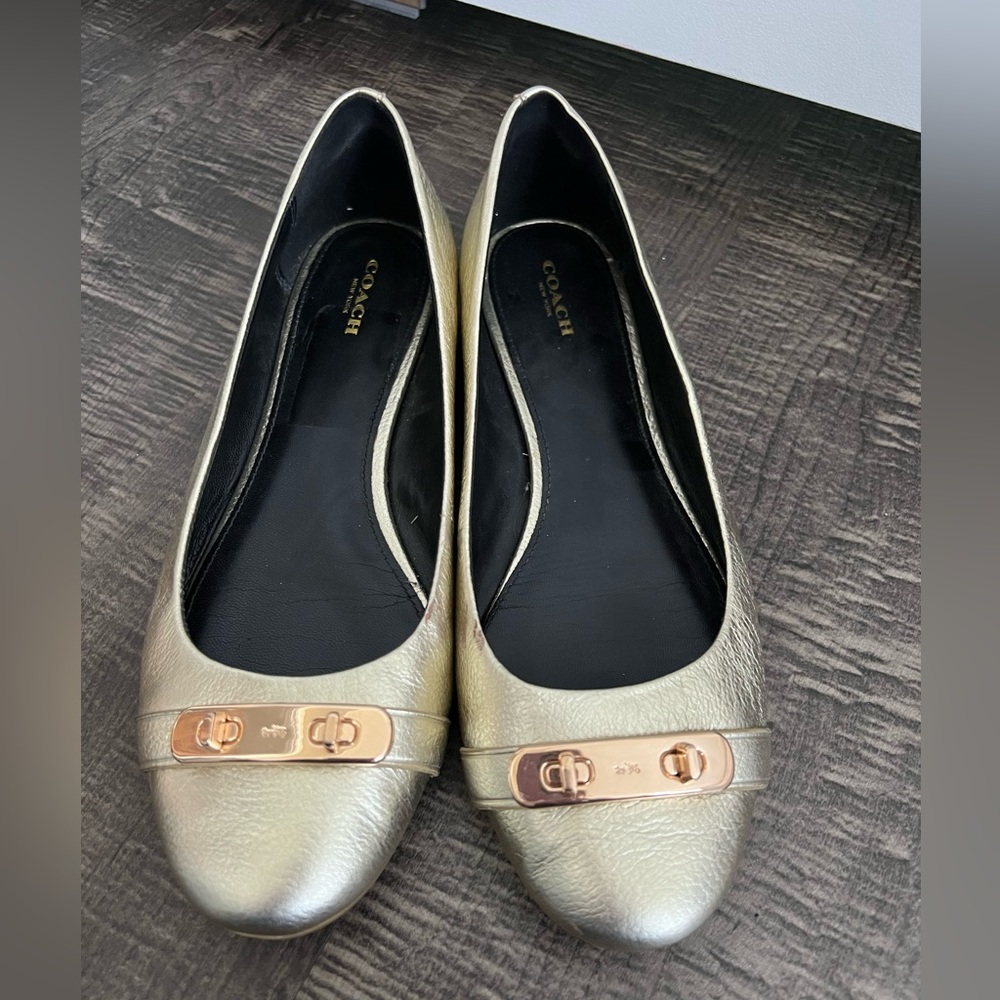 Coach flats in gold. Great condition, barely worn